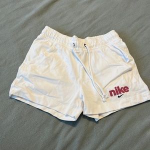 White Nike shorts
